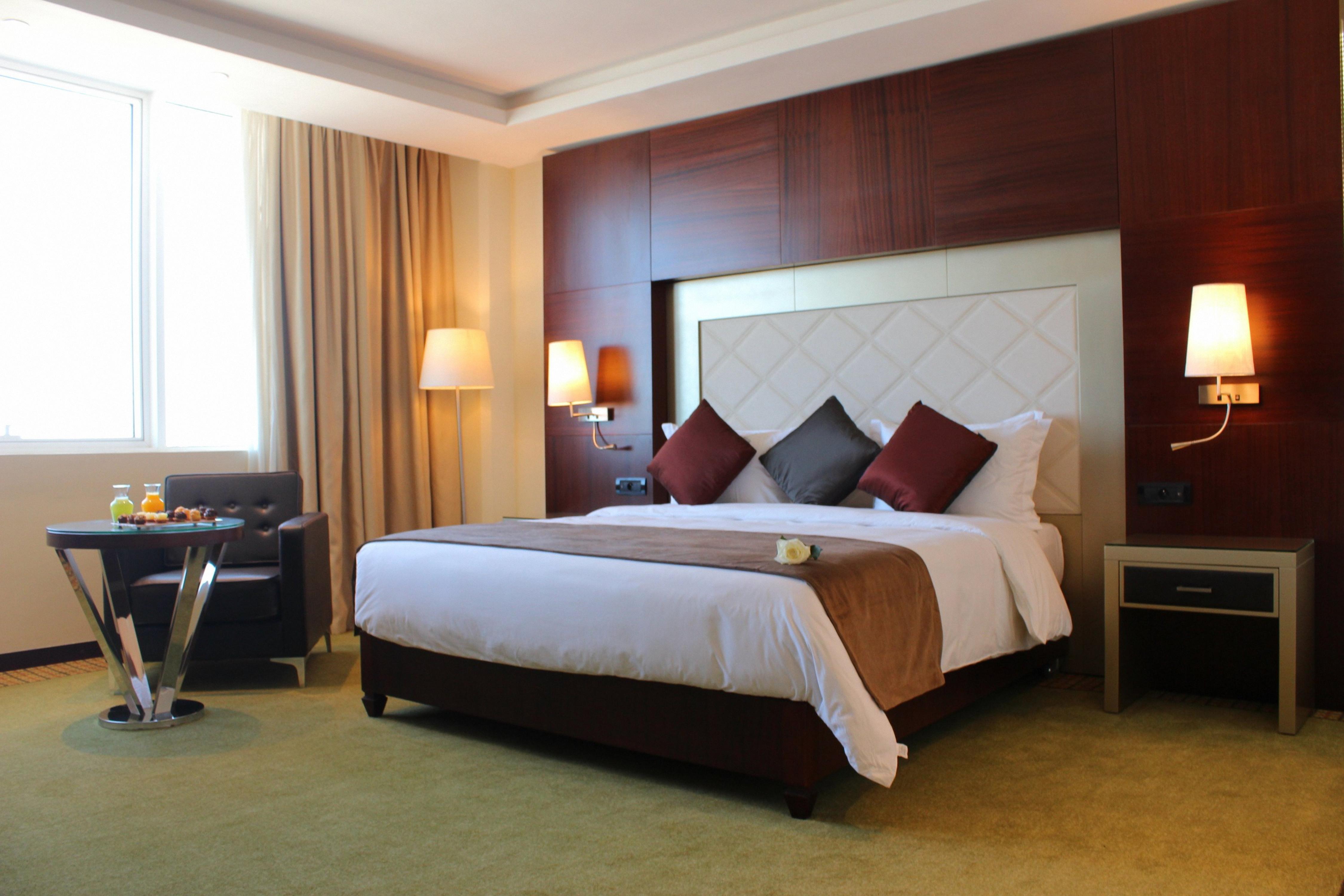 Grand Mogador City Center Casablanca Exterior photo A bedroom at the hotel