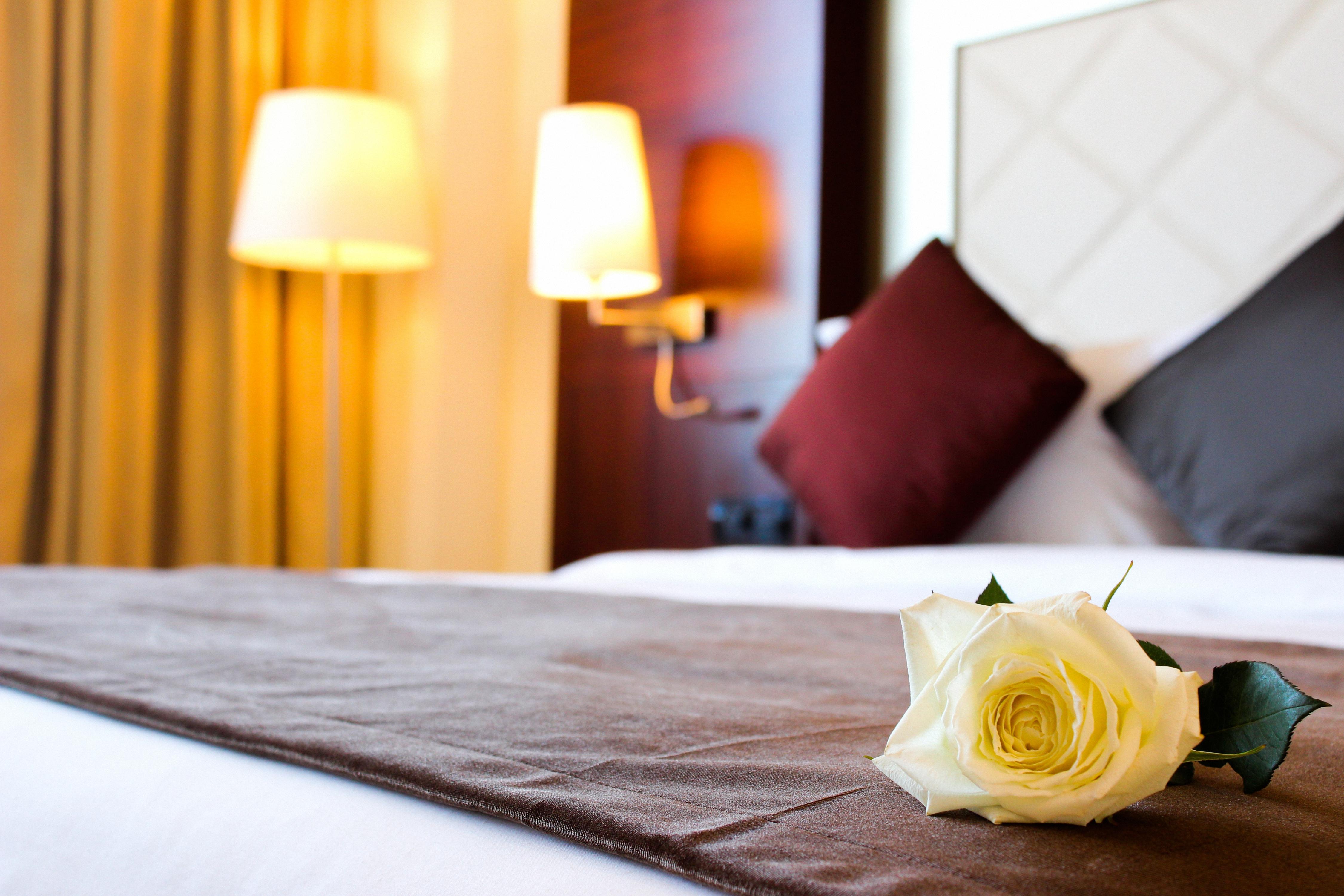 Grand Mogador City Center Casablanca Exterior photo A rose on a bed