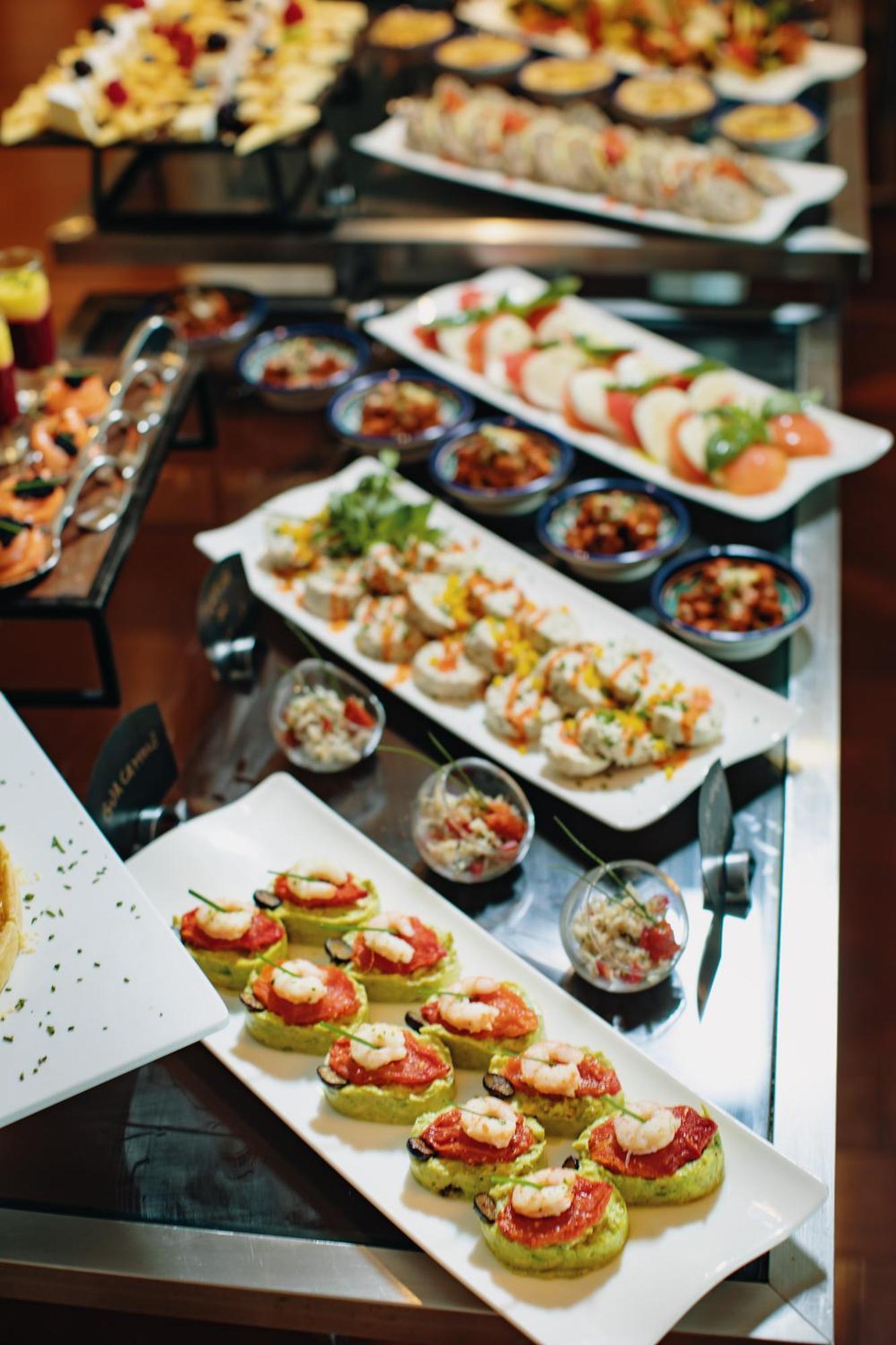 Grand Mogador City Center Casablanca Exterior photo A buffet of various salads