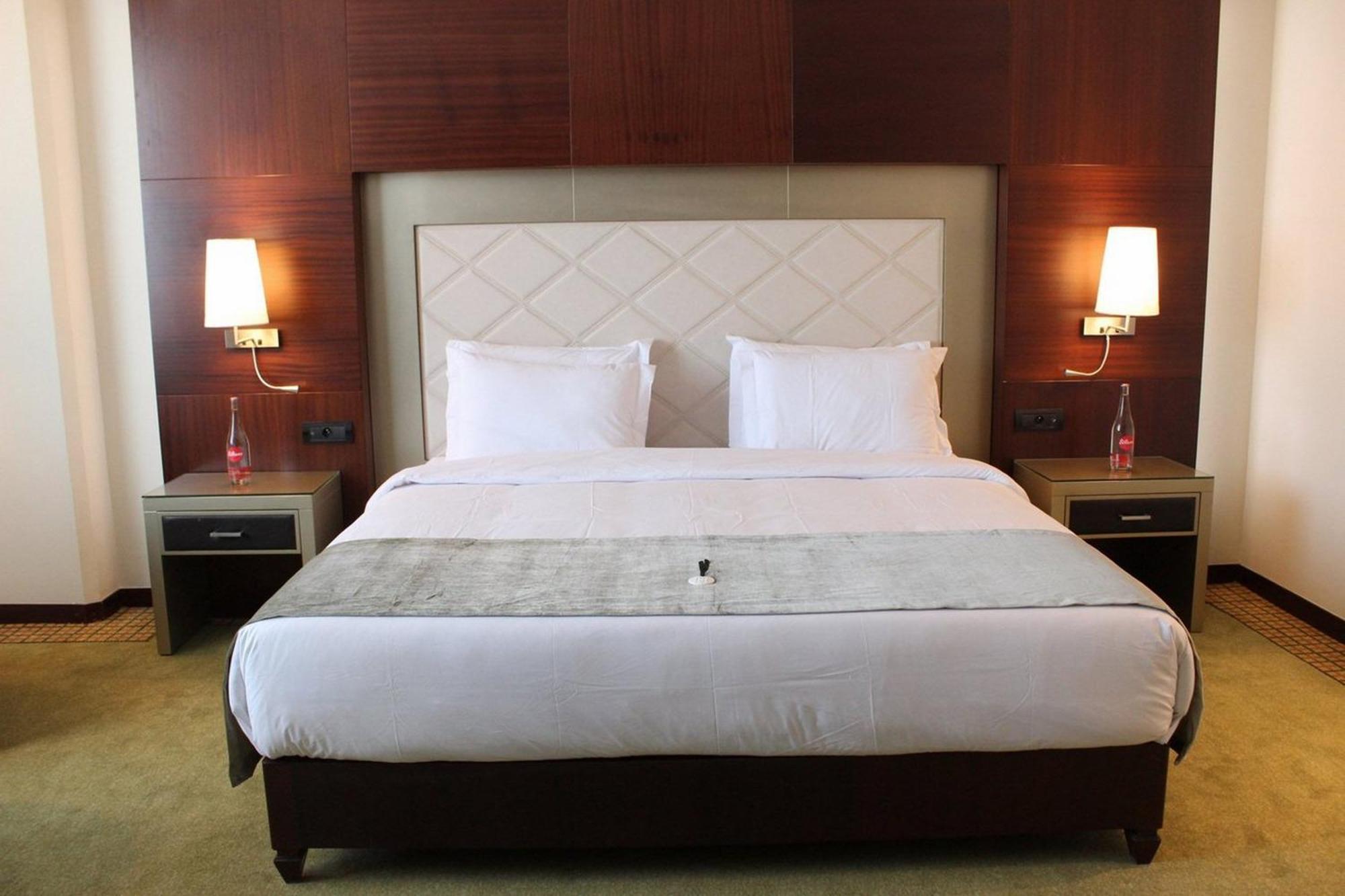 Grand Mogador City Center Casablanca Exterior photo A bedroom at the hotel