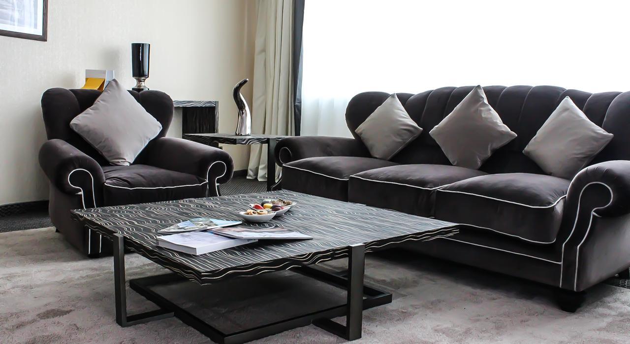 Grand Mogador City Center Casablanca Exterior photo A living room