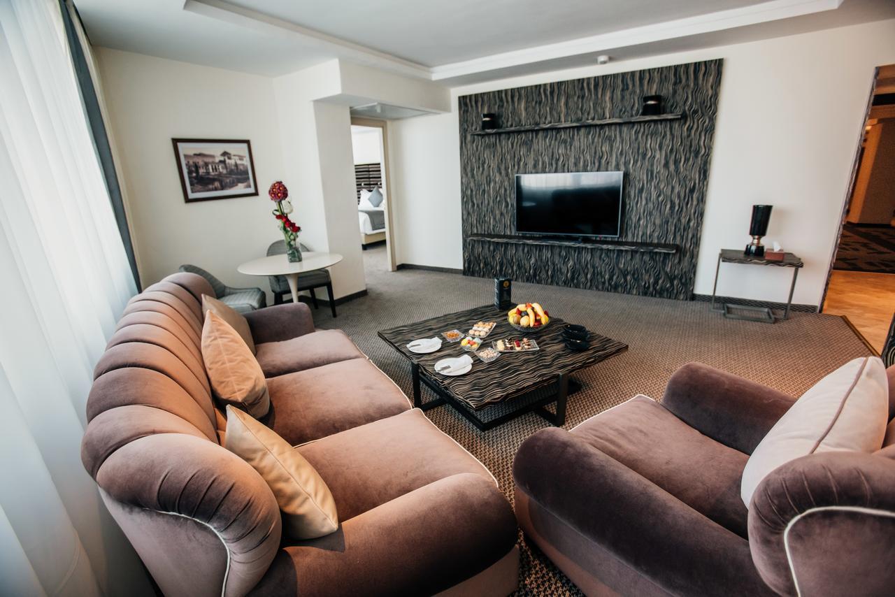 Grand Mogador City Center Casablanca Exterior photo A living room in a hotel