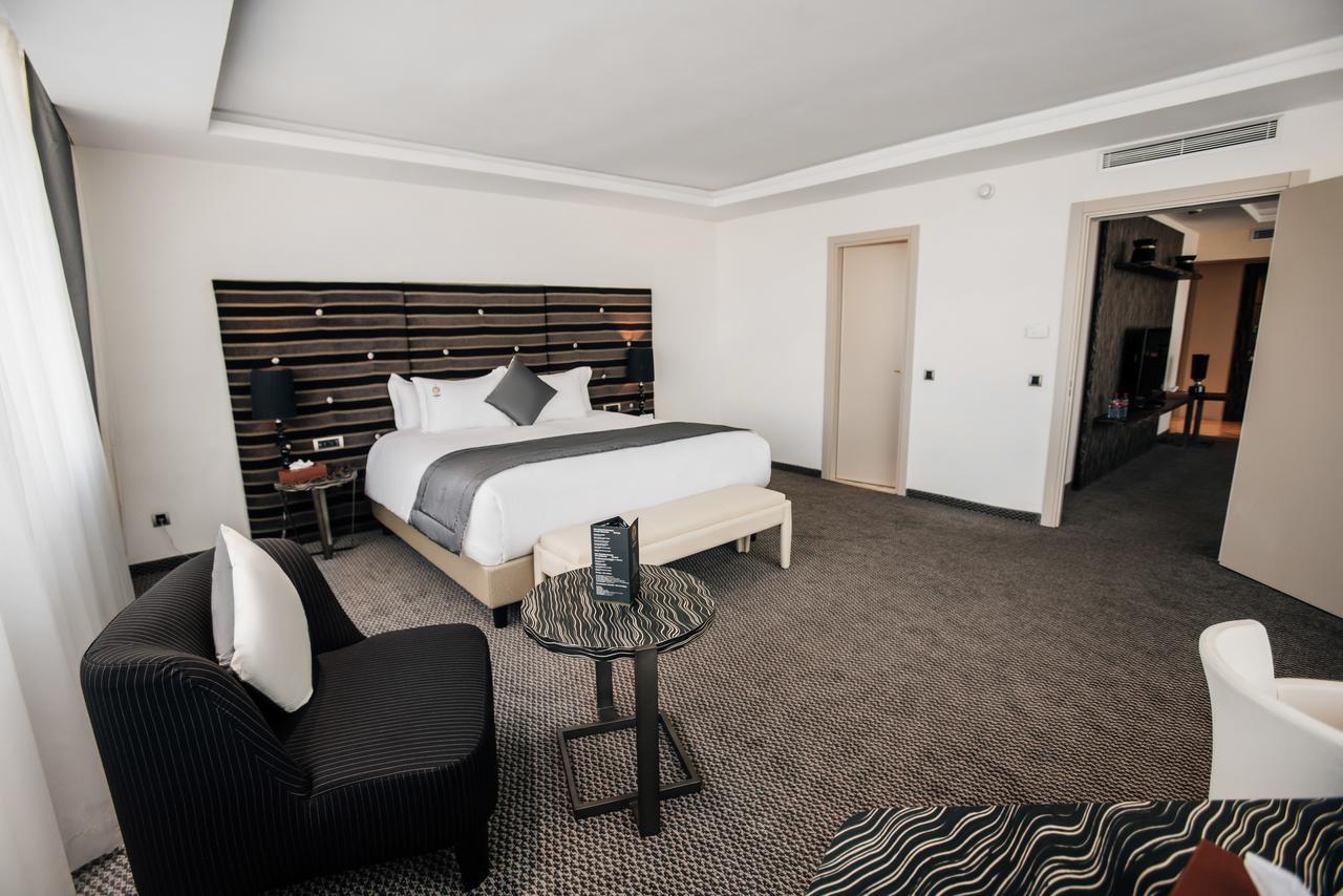Grand Mogador City Center Casablanca Exterior photo A bedroom at the hotel